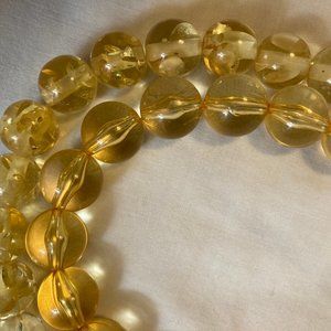 NWT 2 Strands of Transparent Amber-colored large round beads